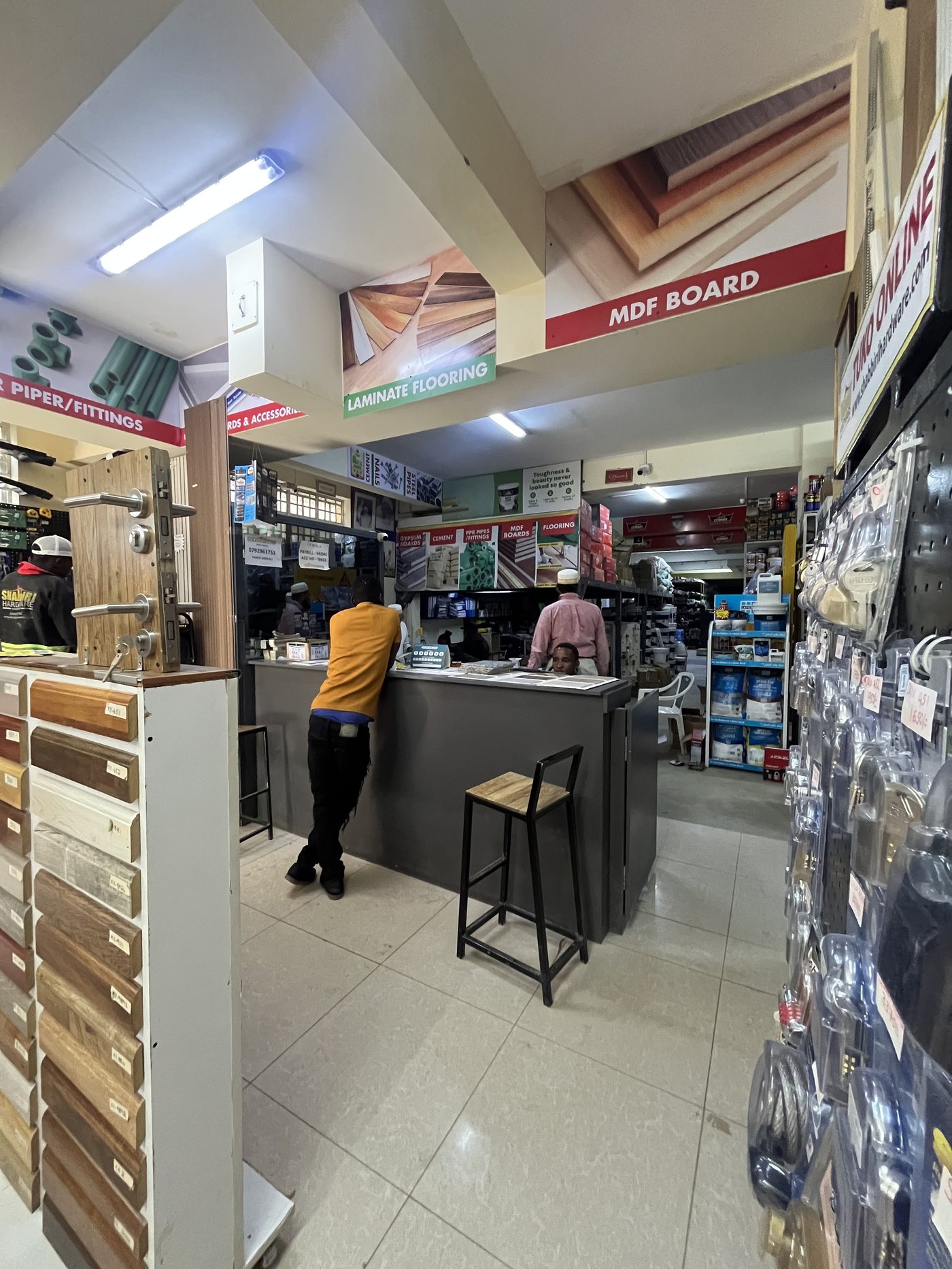 Shabbiri Hardware sales team helping a customer at the Rongai branch counter